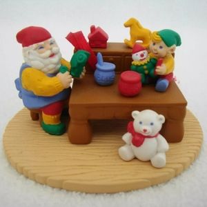 Avon Christmas with Santa ornament in the workshop